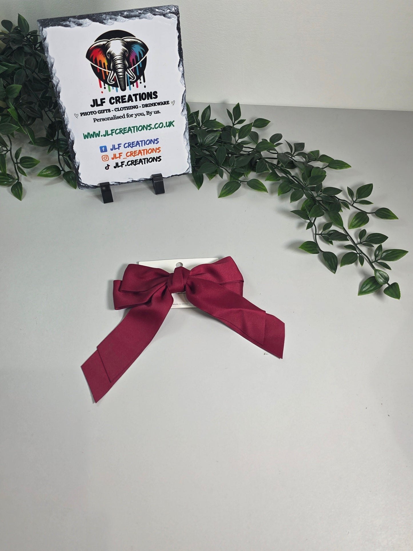 Burgundy bow