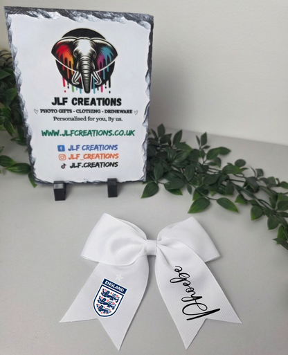 White Child's hair bow - Football