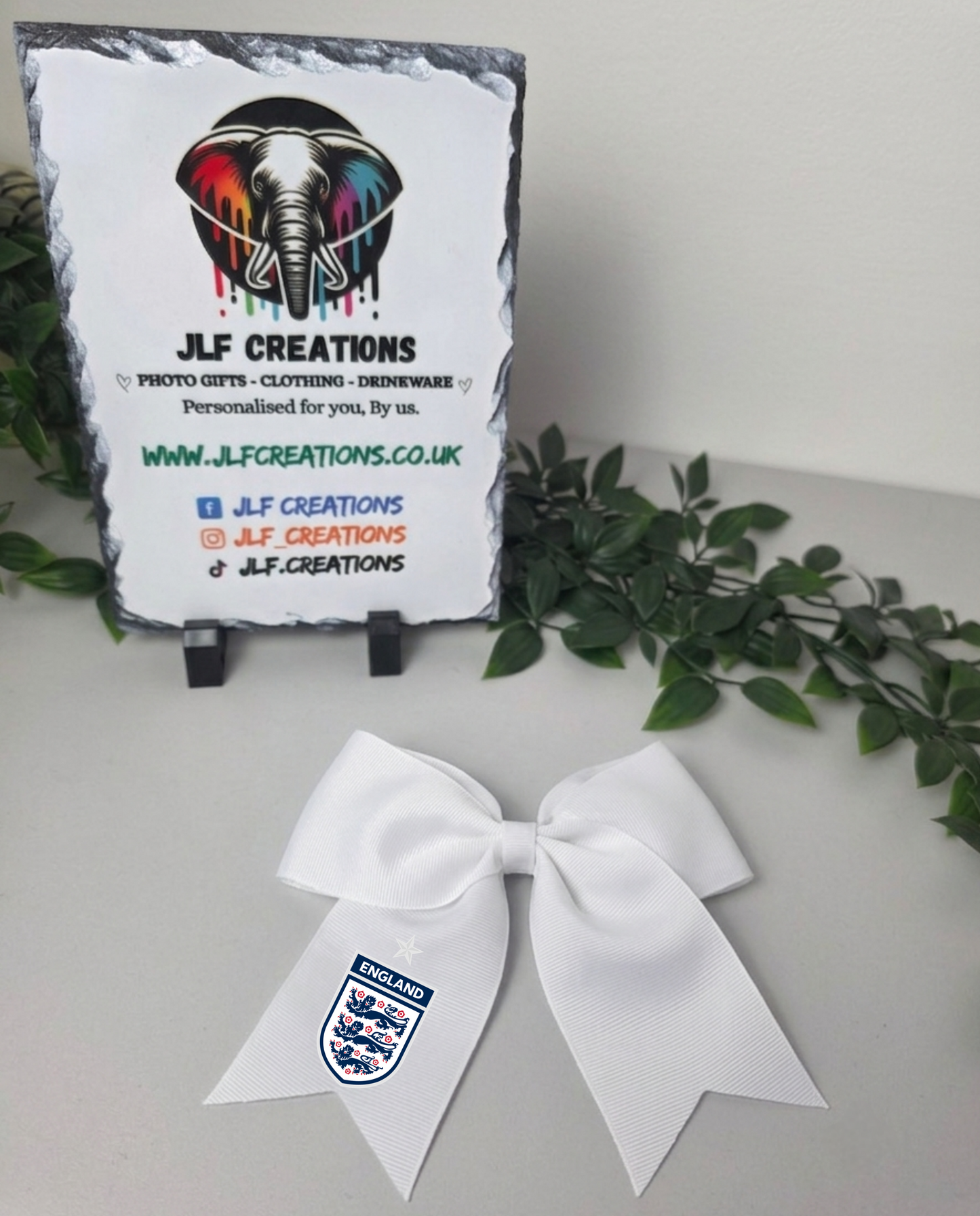 White Child's hair bow - Football